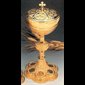 Ciborium, 11 7/8" (30 cm) Ht., 5.5" (14 cm) Diam. - Height: 11 7/8" (30 cm) / Diameter: 5 1/2" (14 cm) / Hand-Hammered finish/ Sterling Cup and Medaillons  N.B.: when the article is not in stock and is "available on order", allow a lead time of about 4 weeks.